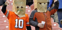 Sad Cleveland Browns fans with paper bags on their heads