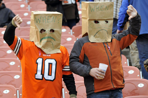 Sad Cleveland Browns fans with paper bags on their heads