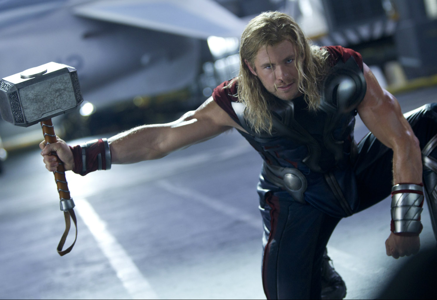 Thor grabs his hammer Mjolnir on the deck of the helicarrier in The Avengers